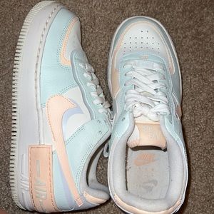 Nike Air Forces. Peach, light green color with a little bit of gray